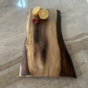Handcrafted live edge charcuterie board with dark and light grain